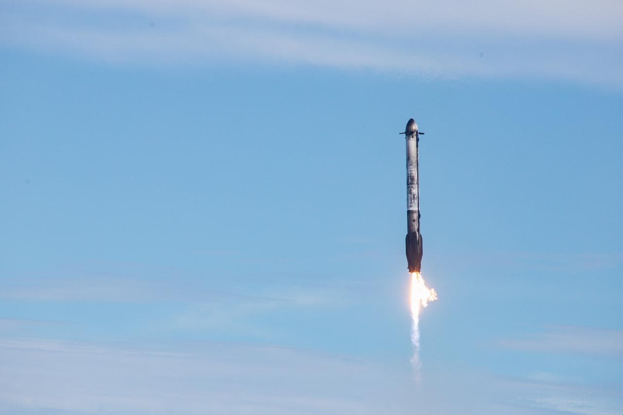 Falcon Heavy's two side boosters landing simultaneously at Cape Canaveral