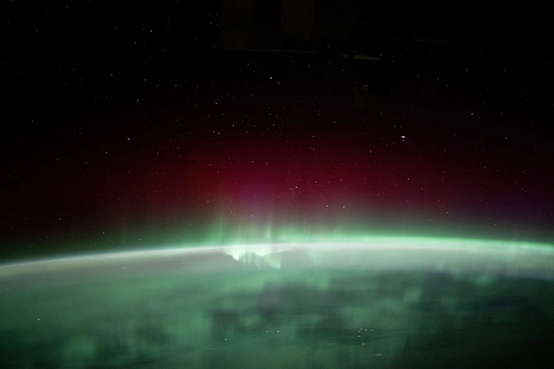 Aurora borealis lighting the night sky — another spectacular atmospheric phenomenon that shares the dark sky with meteor showers