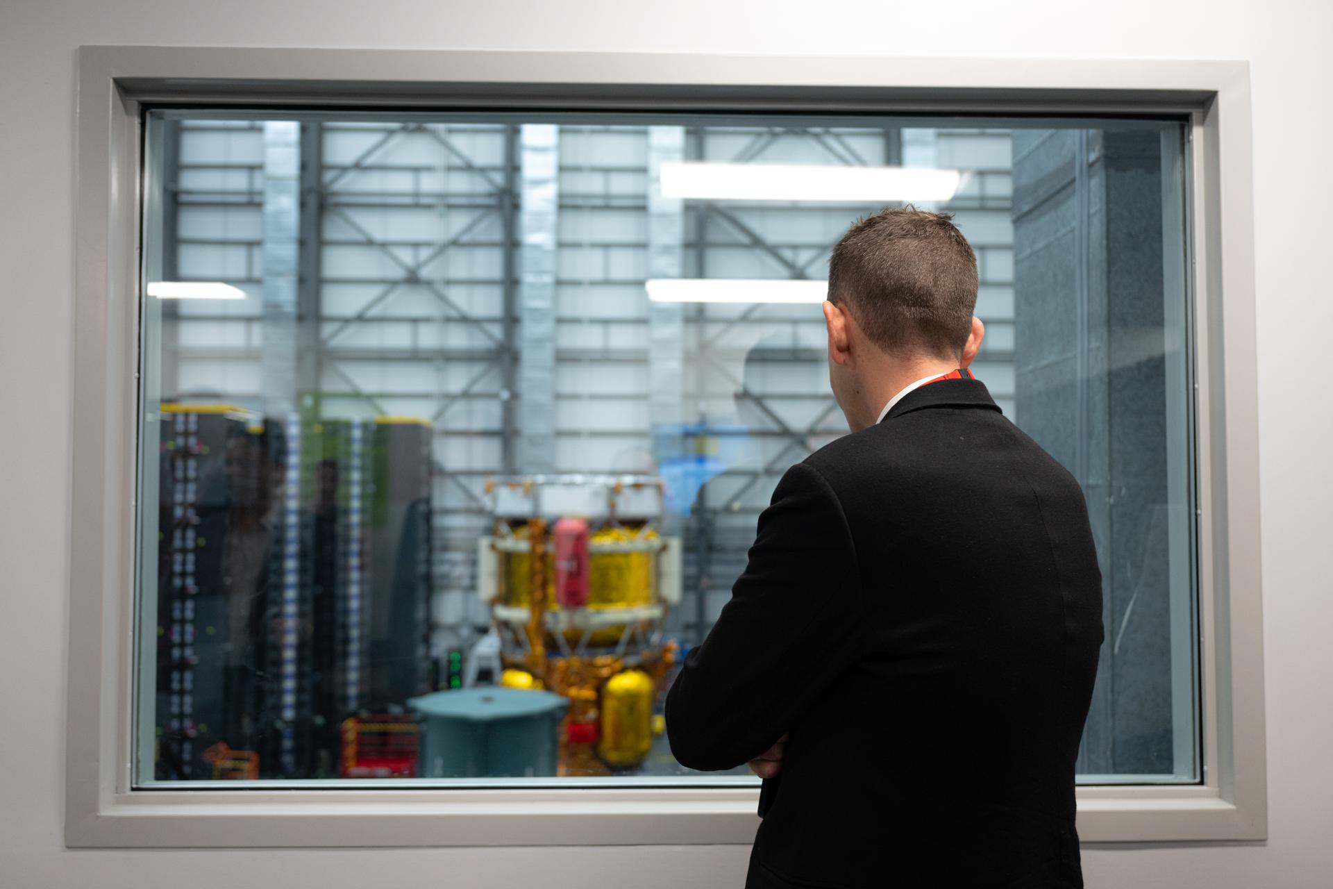 NASA Administrator Isaacman views Blue Origin's Blue Moon Mk.1 lunar lander named Endurance through a factory observation window at Blue Origin's facility, January 2026