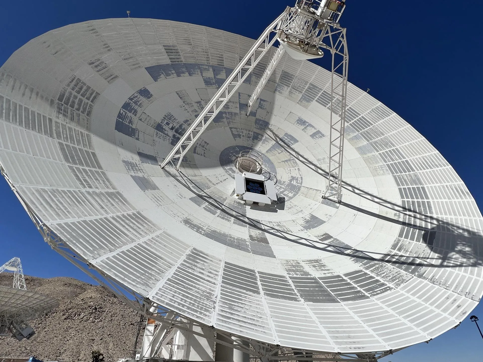 A NASA Deep Space Network 70-metre tracking antenna — part of the global ground infrastructure that supports both civil and defence space operations
