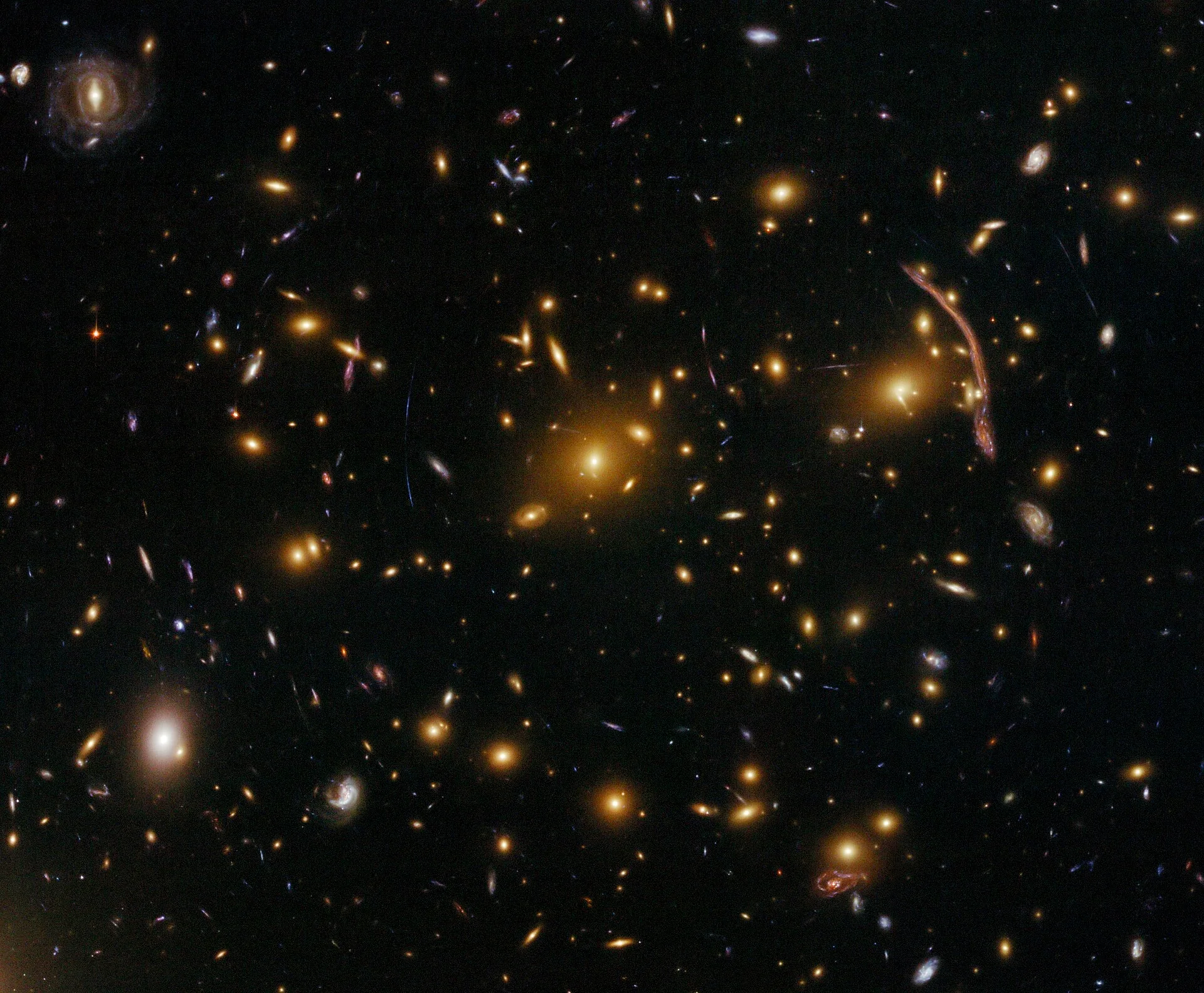 Gravitational lensing effect showing distant galaxies distorted by a massive foreground object