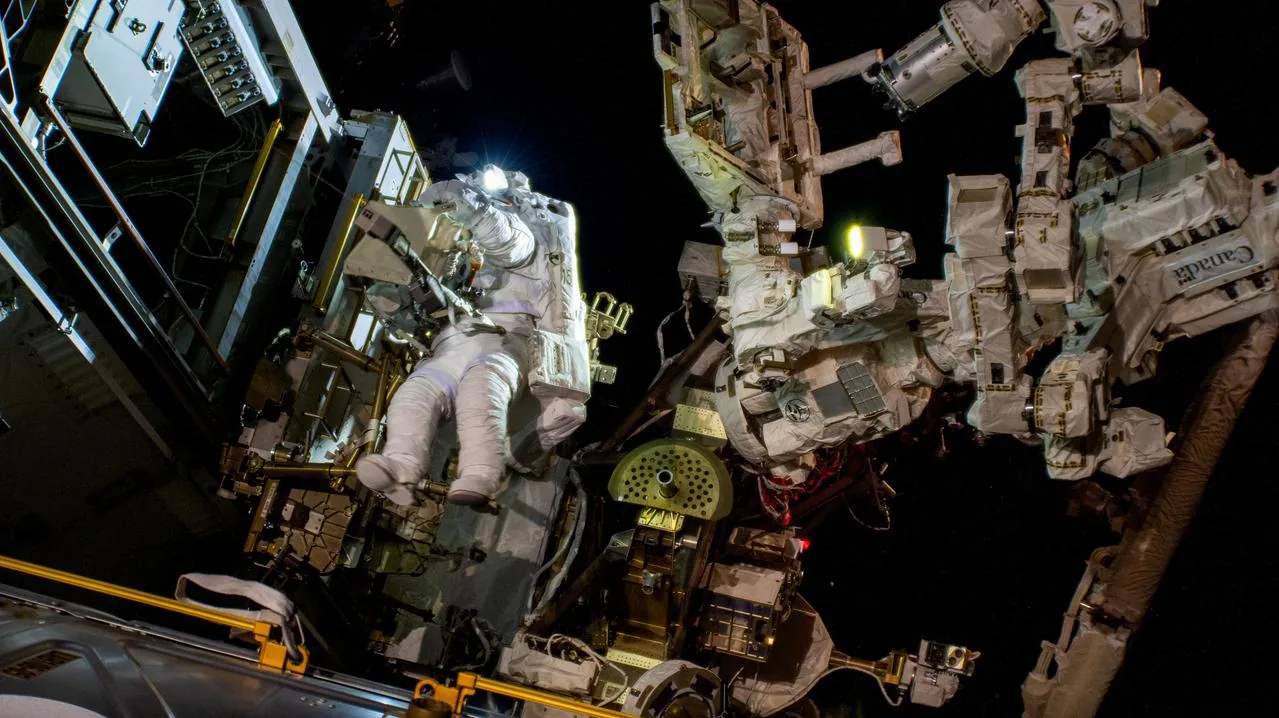 An astronaut performing a spacewalk outside the ISS