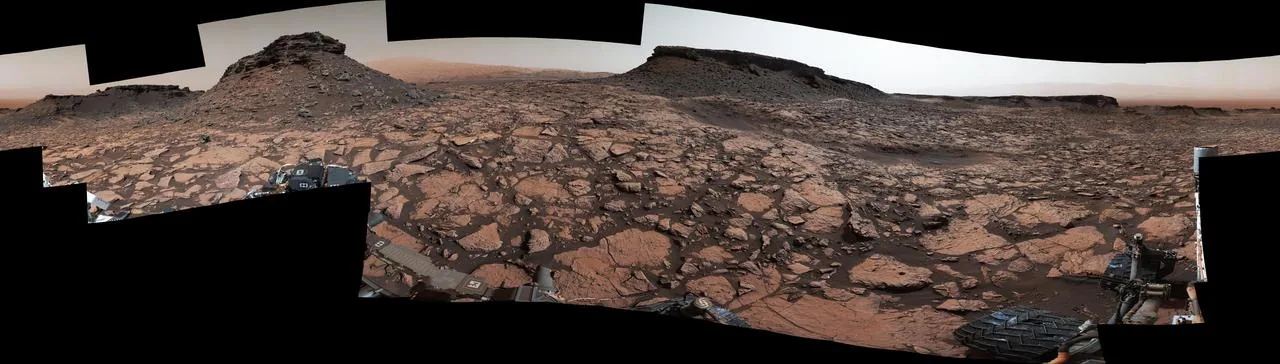 Mount Sharp's sedimentary layers photographed by Curiosity — billions of years of Martian geological history that terraforming would irrevocably alter