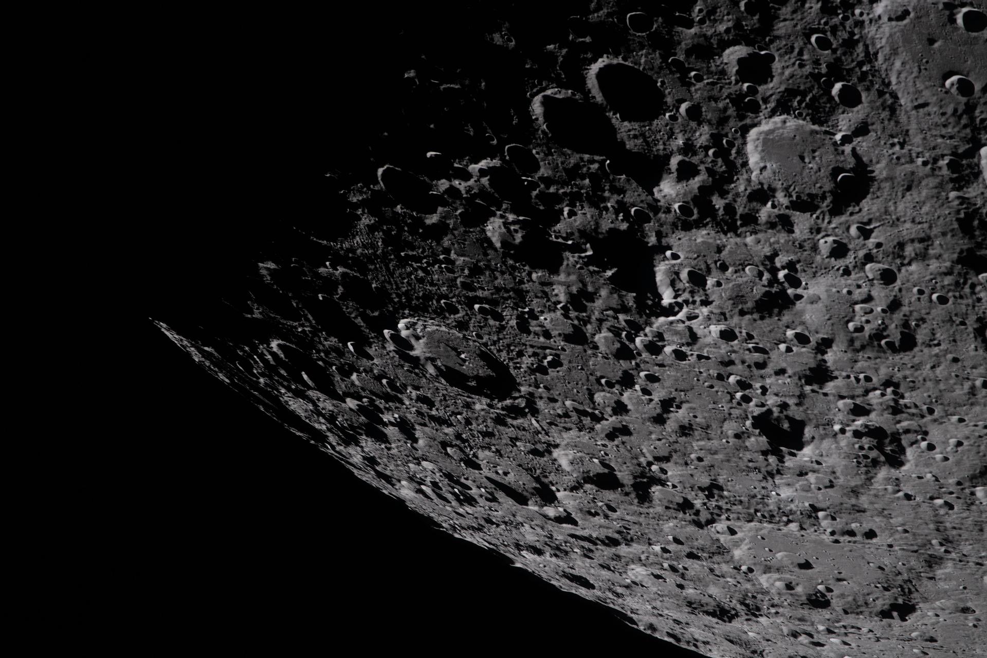 Heavily cratered far-side lunar terrain along the South Pole–Aitken basin photographed by the Artemis II crew in April 2026