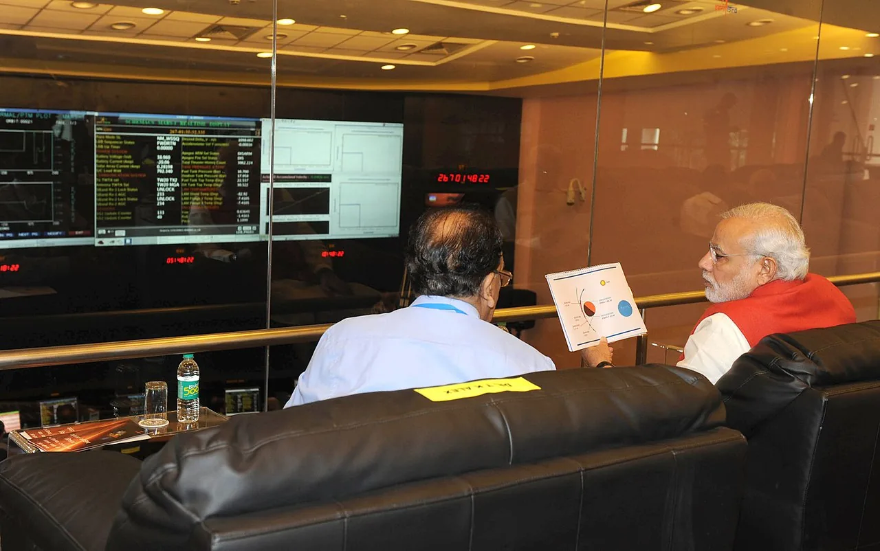 Prime Minister Modi and ISRO scientists celebrate the Mars Orbiter Mission's successful orbital insertion