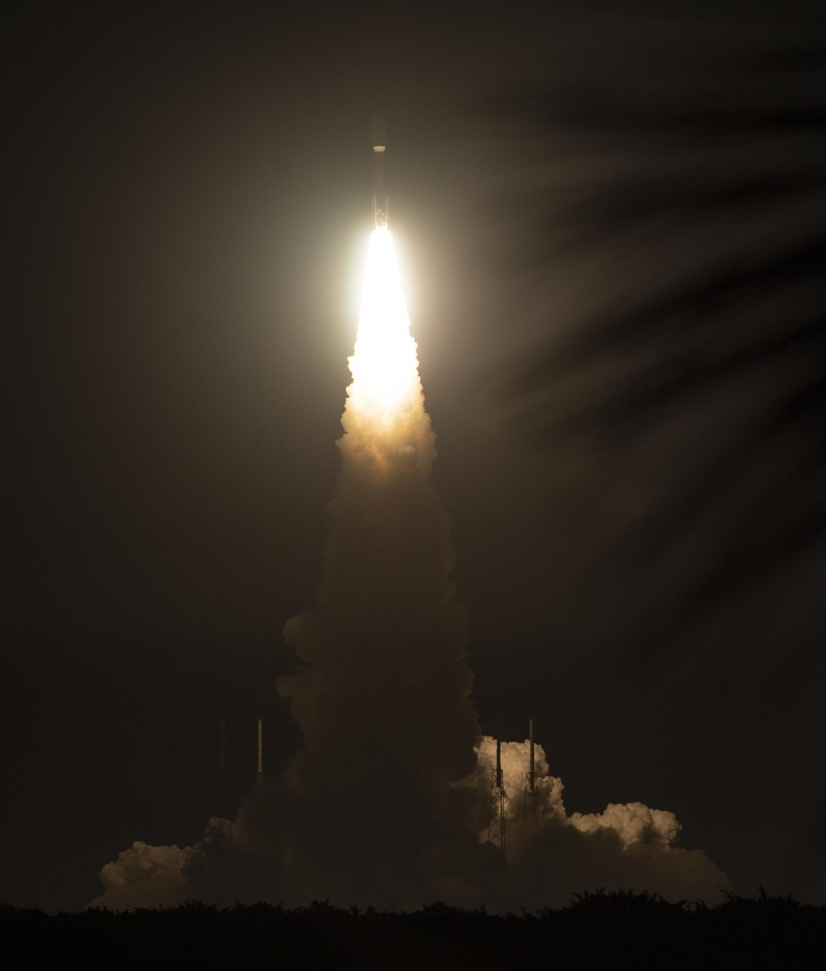A night launch of a military payload, illustrating the around-the-clock tempo of defense satellite deployments as space militarization accelerates