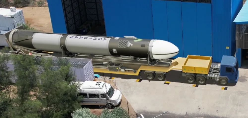 Agnikul's Agnibaan launch vehicle on its transporter outside the company's facility.