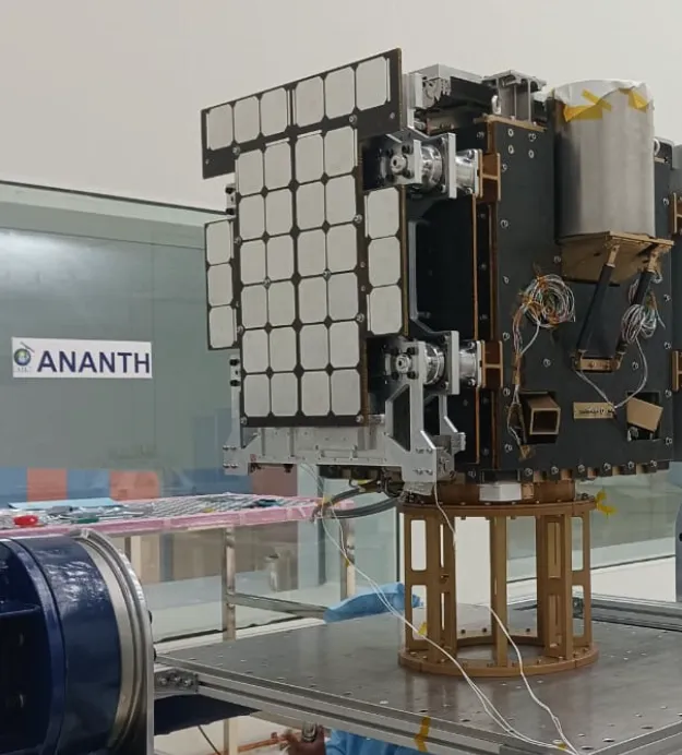 GalaxEye's Drishti satellite with deployed solar panels on a test stand in Ananth Technologies' cleanroom.