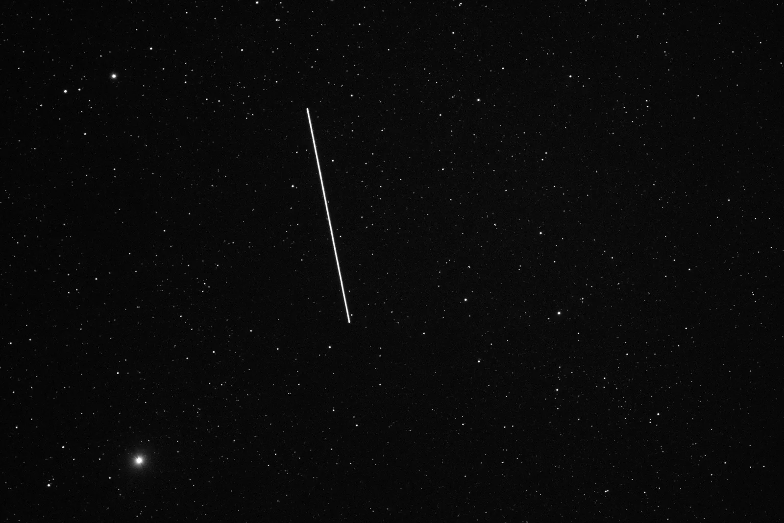 AST SpaceMobile's BlueWalker 3 satellite crosses the night sky over Oukaïmeden Observatory, Morocco — its array so large it is among the brightest objects in the sky.