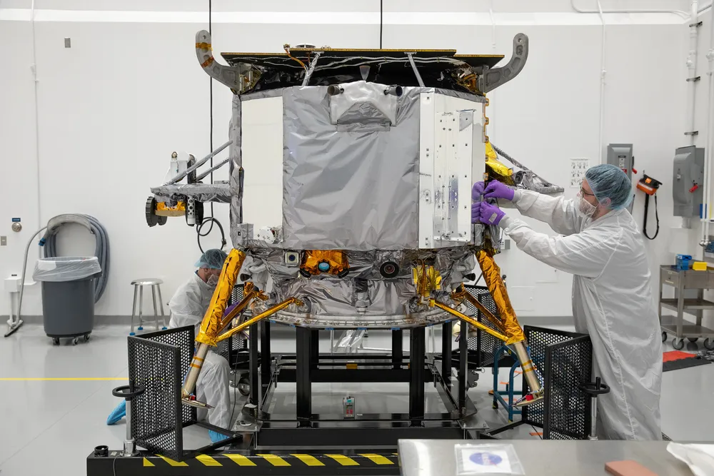 Astrobotic's Peregrine lunar lander during NASA insignia installation at Kennedy Space Center.