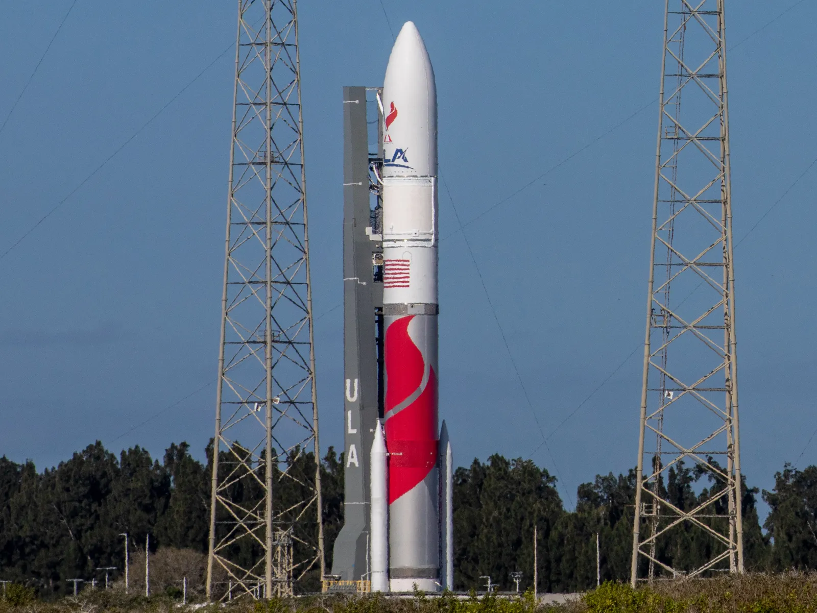 A ULA Vulcan rocket carrying Astrobotic's Peregrine lunar lander rolls to the pad at Cape Canaveral.