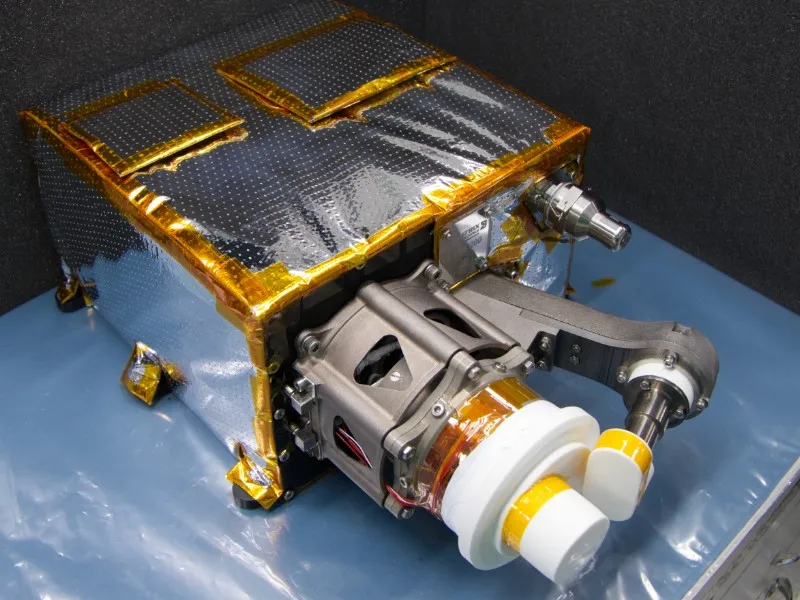 A Bellatrix propulsion module — an integrated thruster and propellant tank wrapped in gold multi-layer insulation.
