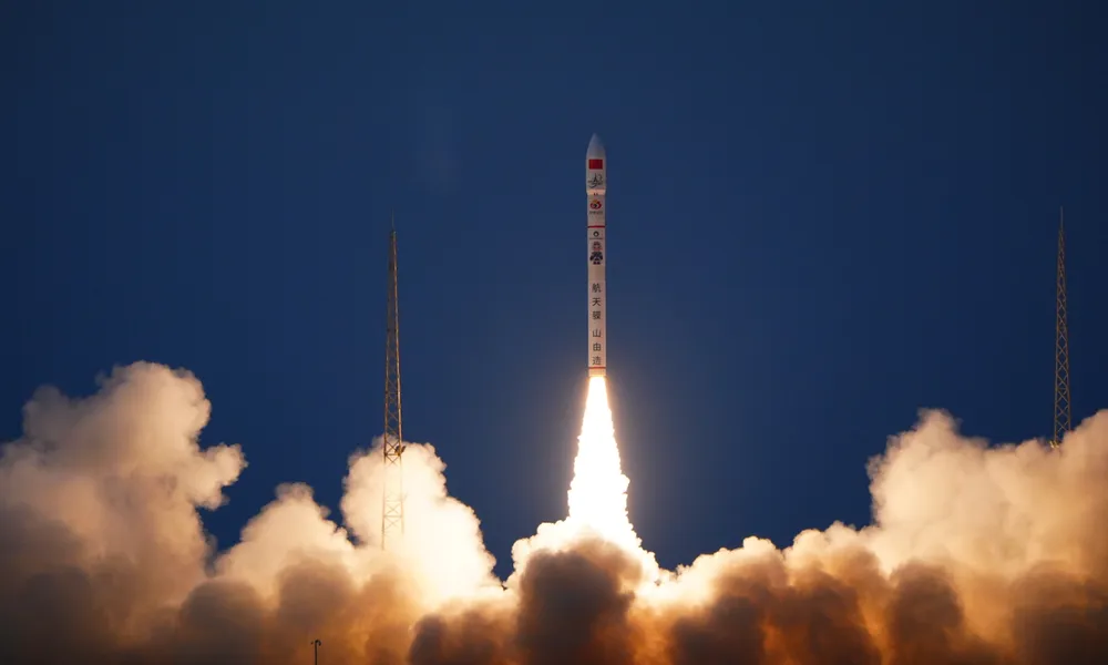 A Galactic Energy Ceres-1 rocket clears the pad at the Jiuquan Satellite Launch Center, January 2025, carrying commercial smallsats.