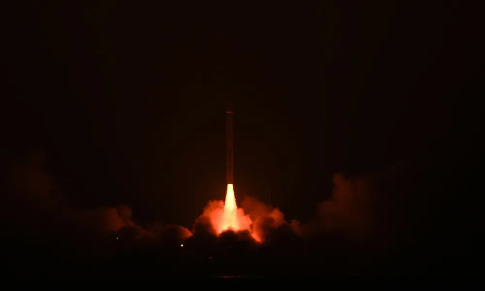 A Galactic Energy Ceres-1 rocket launches before dawn from a sea platform off Shandong, China, January 2026.