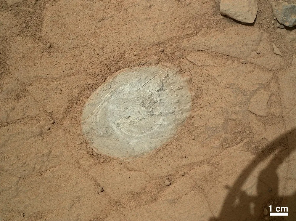 A Martian rock surface cleared by the Honeybee Robotics-built Dust Removal Tool on NASA's Curiosity rover.