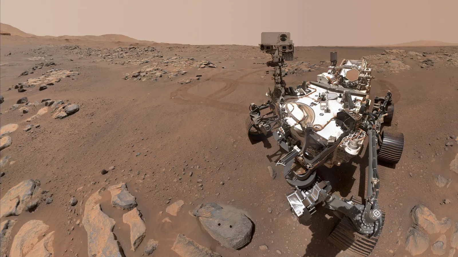 NASA's Perseverance rover selfie at the rock 'Rochette', showing two core-sample boreholes drilled by the rover's Honeybee Robotics-built coring drill.