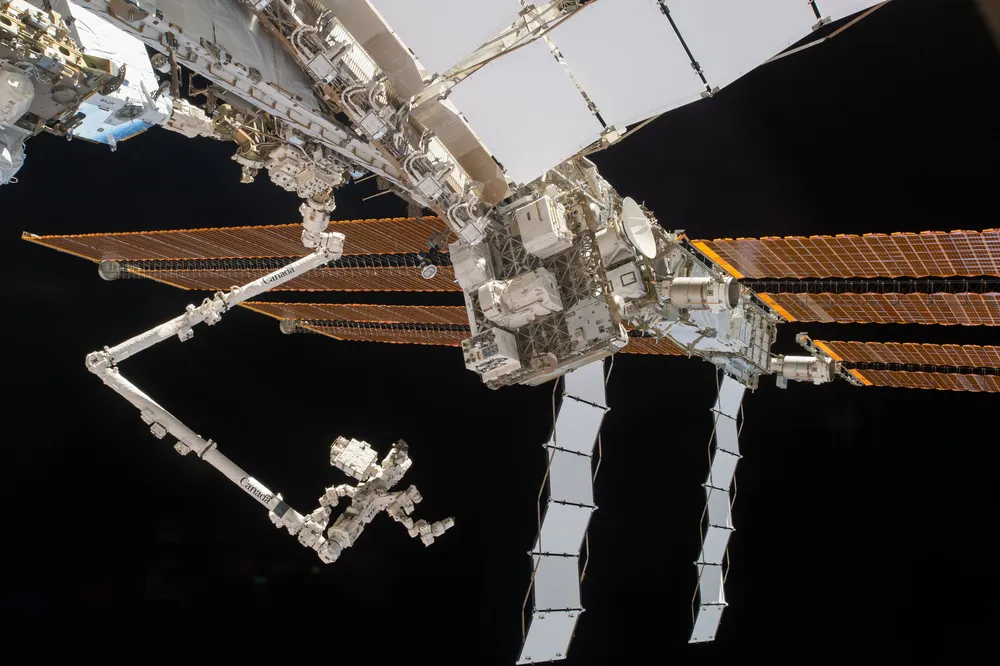 MDA-built Canadarm2 with the Dextre robotic 'handyman' during an ISS battery upgrade.