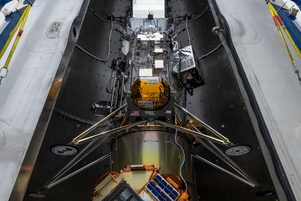 The Intuitive Machines IM-2 Athena lander — carrying Nokia's lunar cellular network — encapsulated inside the SpaceX Falcon 9 payload fairing before its February 2025 launch.