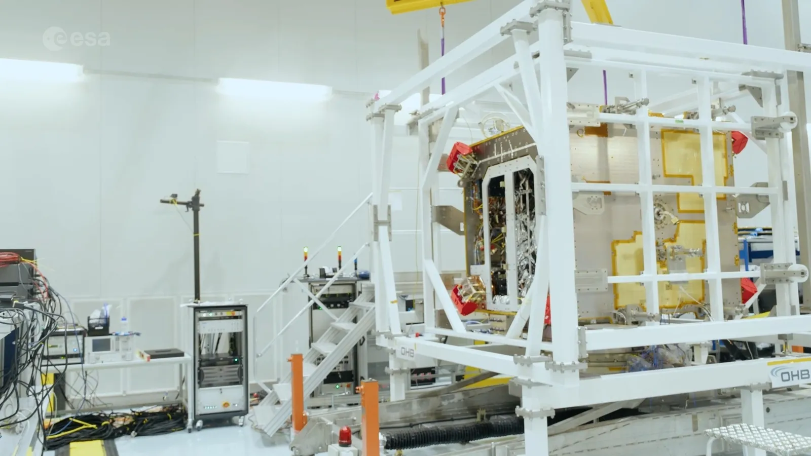 The fully assembled Hera planetary-defence spacecraft stands complete in OHB's cleanroom in Bremen, Germany, after its core and propulsion modules were mated — OHB is prime contractor for ESA's Hera asteroid mission.
