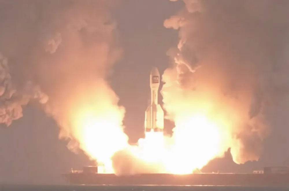 Exhaust billows across the launch vessel as Orienspace's Gravity-1 clears the deck in the Yellow Sea, October 2025.