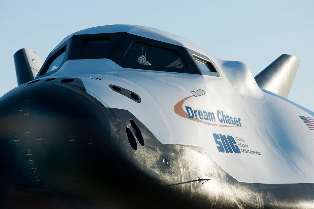 Sierra Space's Dream Chaser lifting-body spaceplane at sunrise.