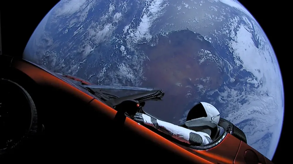 The Starman mannequin in Elon Musk's Tesla Roadster after the Falcon Heavy demo flight.