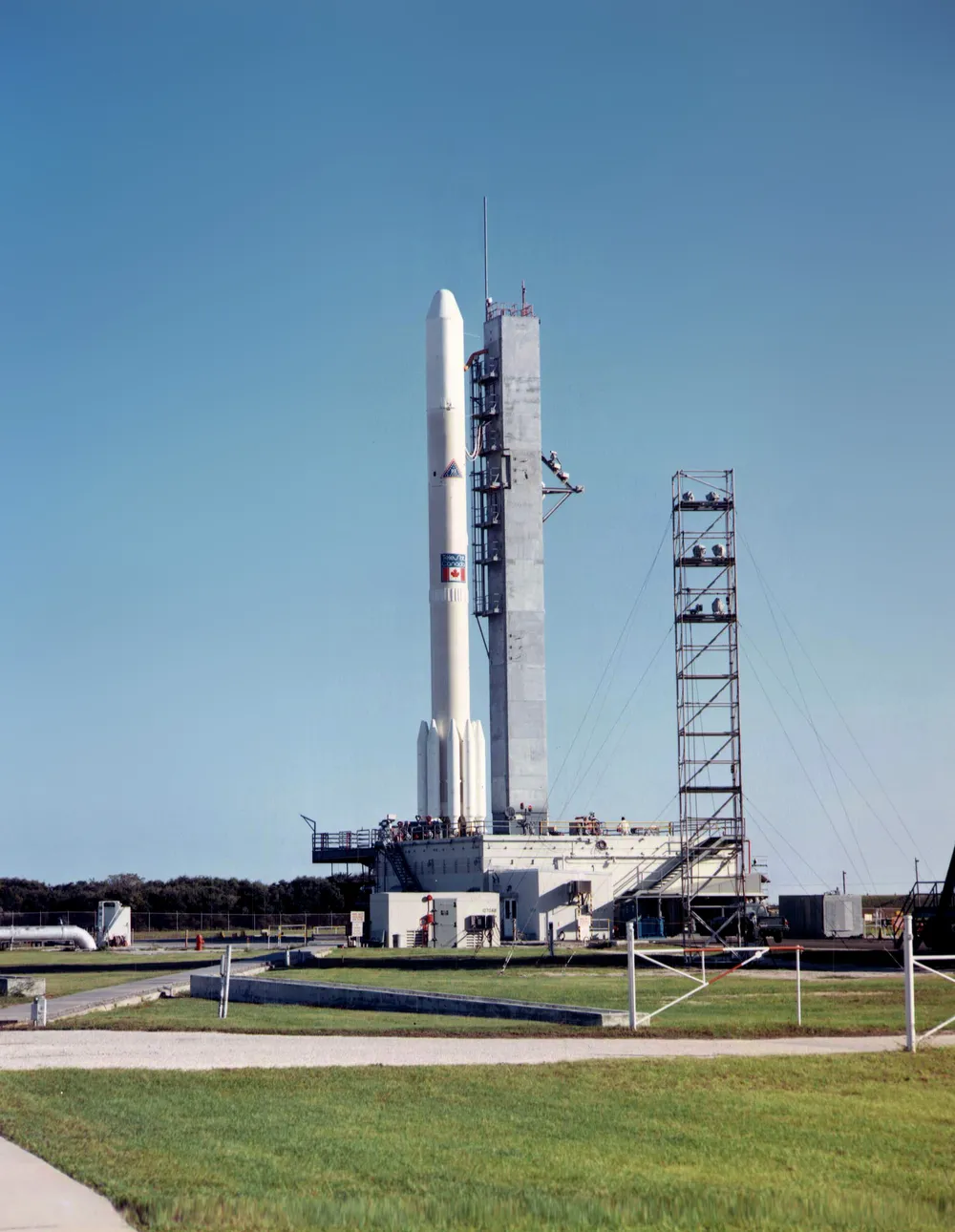 A Delta 1914 rocket carrying Telesat's Anik A1 communications satellite at Cape Canaveral, 1972 — the first commercial domestic comms satellite in geostationary orbit.