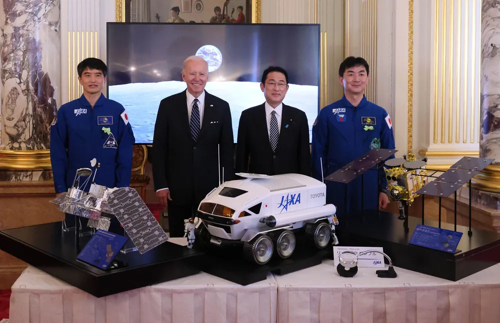 Japanese PM Fumio Kishida and U.S. President Joe Biden view a model of the pressurised lunar rover in Tokyo, May 2022.