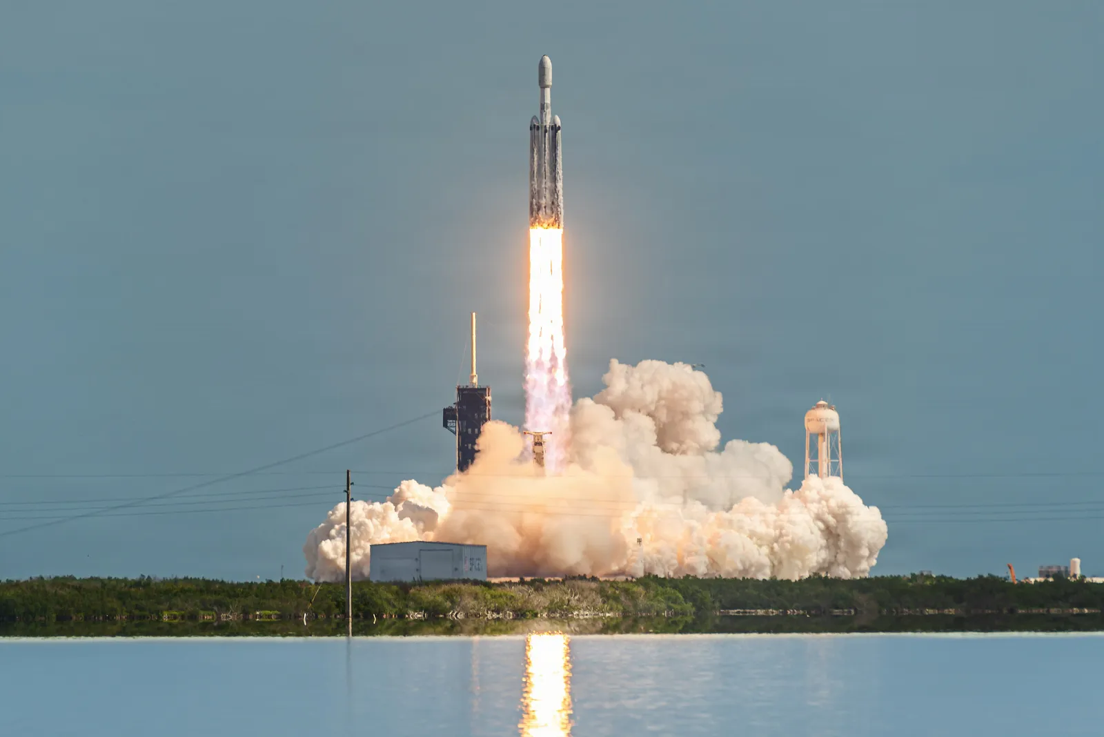 A SpaceX Falcon Heavy lifts off from Kennedy Space Center carrying Viasat's ViaSat-3 F3 broadband satellite, completing the three-satellite constellation, April 2026.
