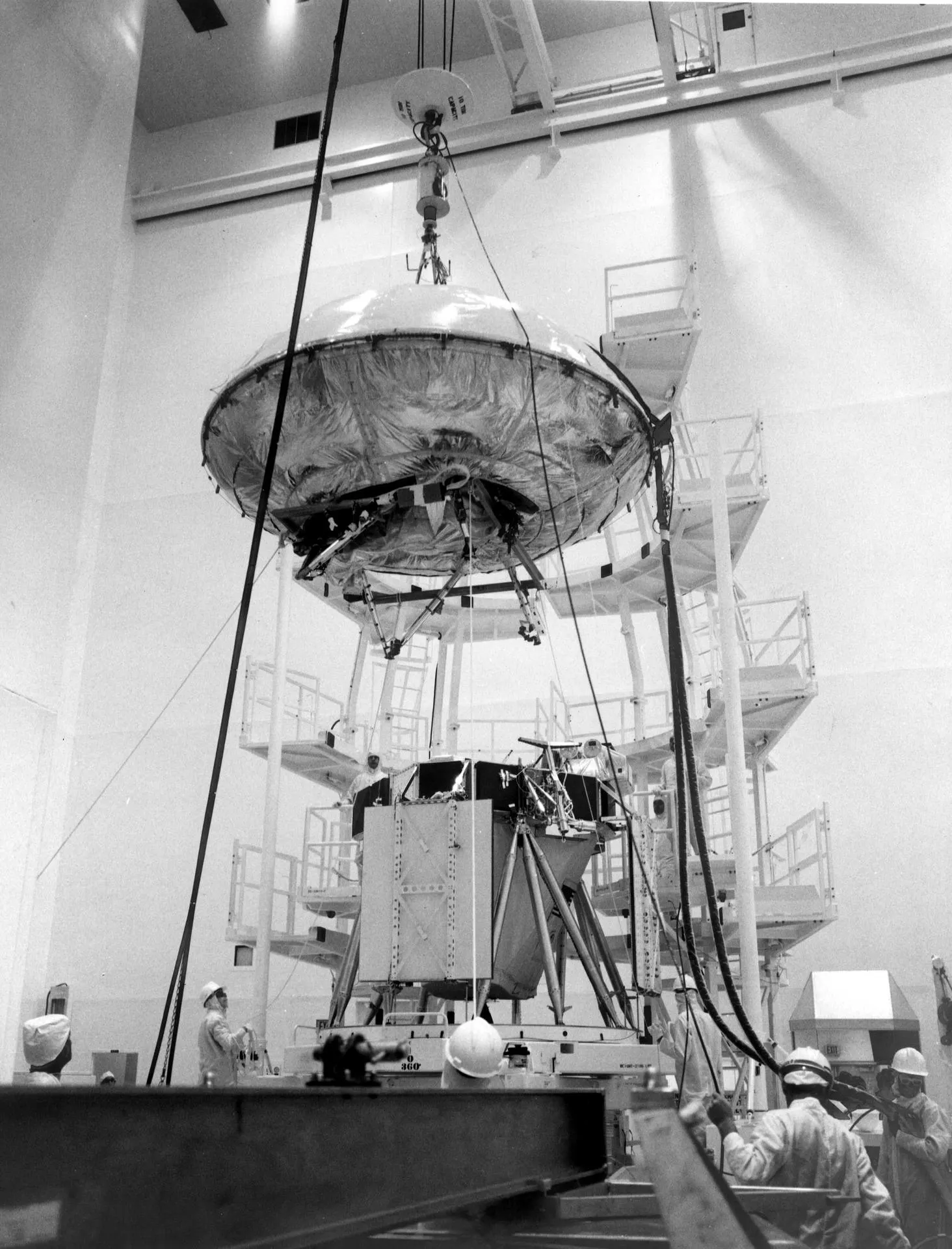 Mated Viking lander and orbiter in the Kennedy Space Center assembly facility, 1975