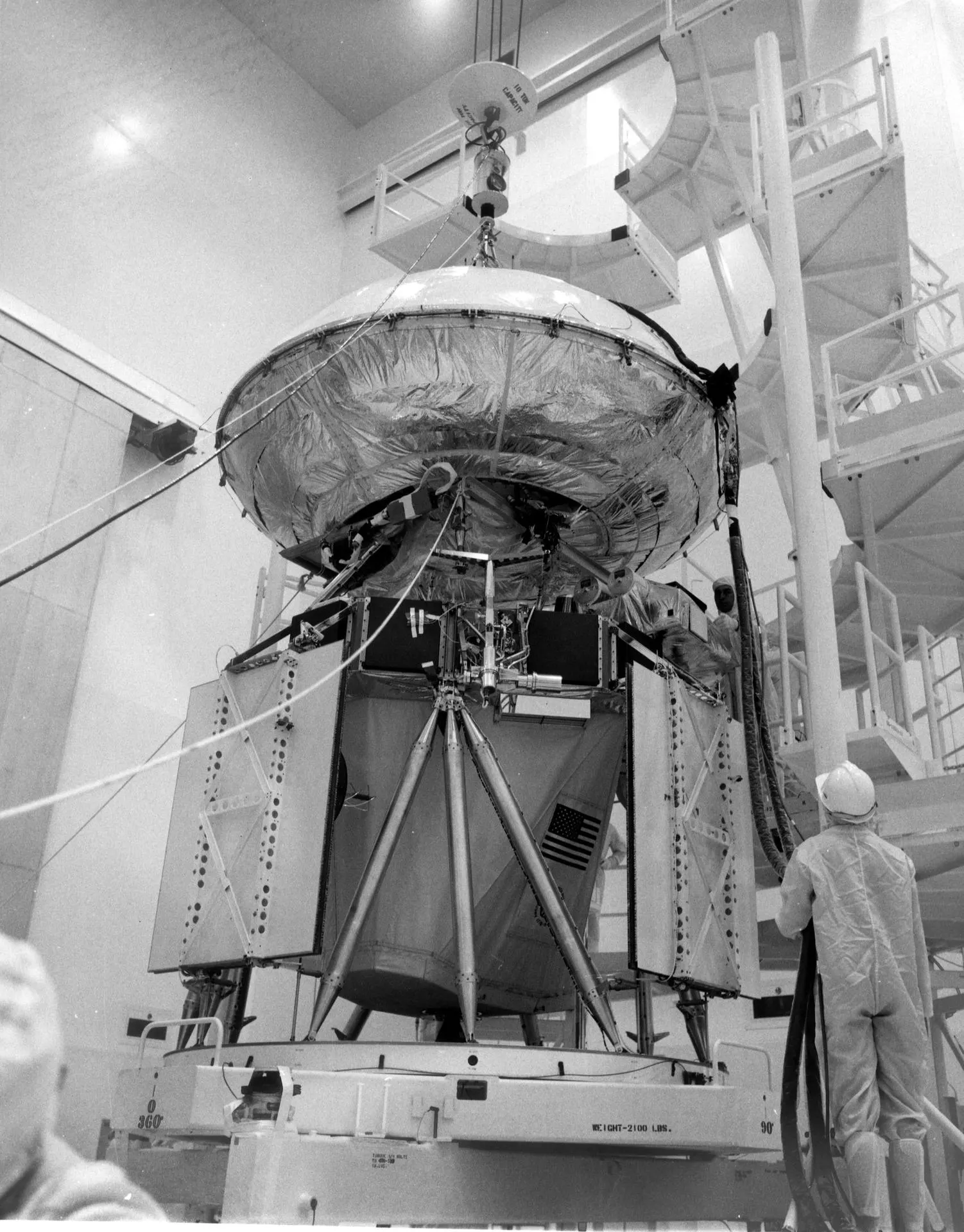 Mated Viking lander and orbiter during integration at Kennedy Space Center, 1975