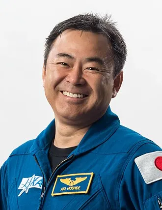Akihiko Hoshide in his JAXA flight suit aboard the ISS.
