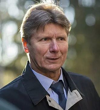 Gennady Padalka in his Roscosmos flight suit, holder of cumulative time record (until 2024).