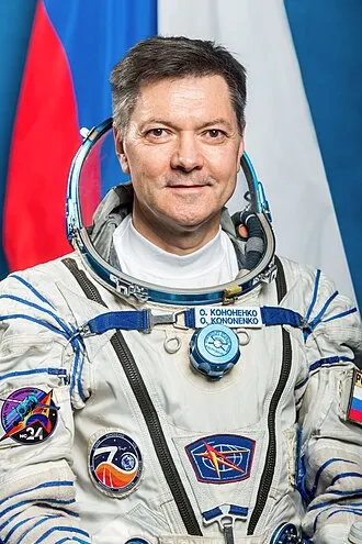 Oleg Kononenko in his Roscosmos flight suit, the all-time leader in cumulative spaceflight time.