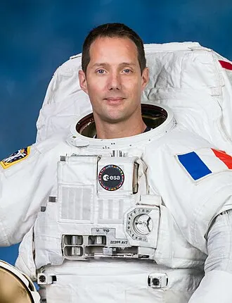 Thomas Pesquet in his ESA flight suit aboard the ISS.