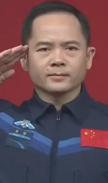 Zhang Lu in his CMSA flight suit aboard the Tiangong space station.