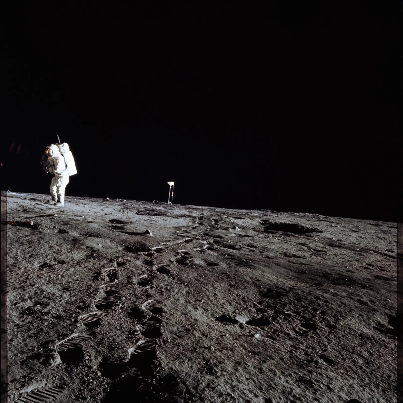 Apollo 12 — Al Bean with the lunar TV camera near the rim of Surveyor Crater