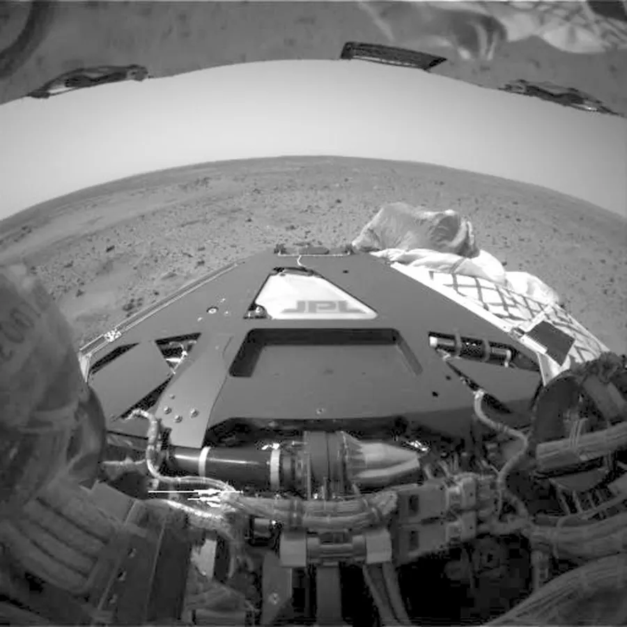 Front hazard-camera view of Spirit's deck on Mars just after its 2004 landing, JPL logo visible