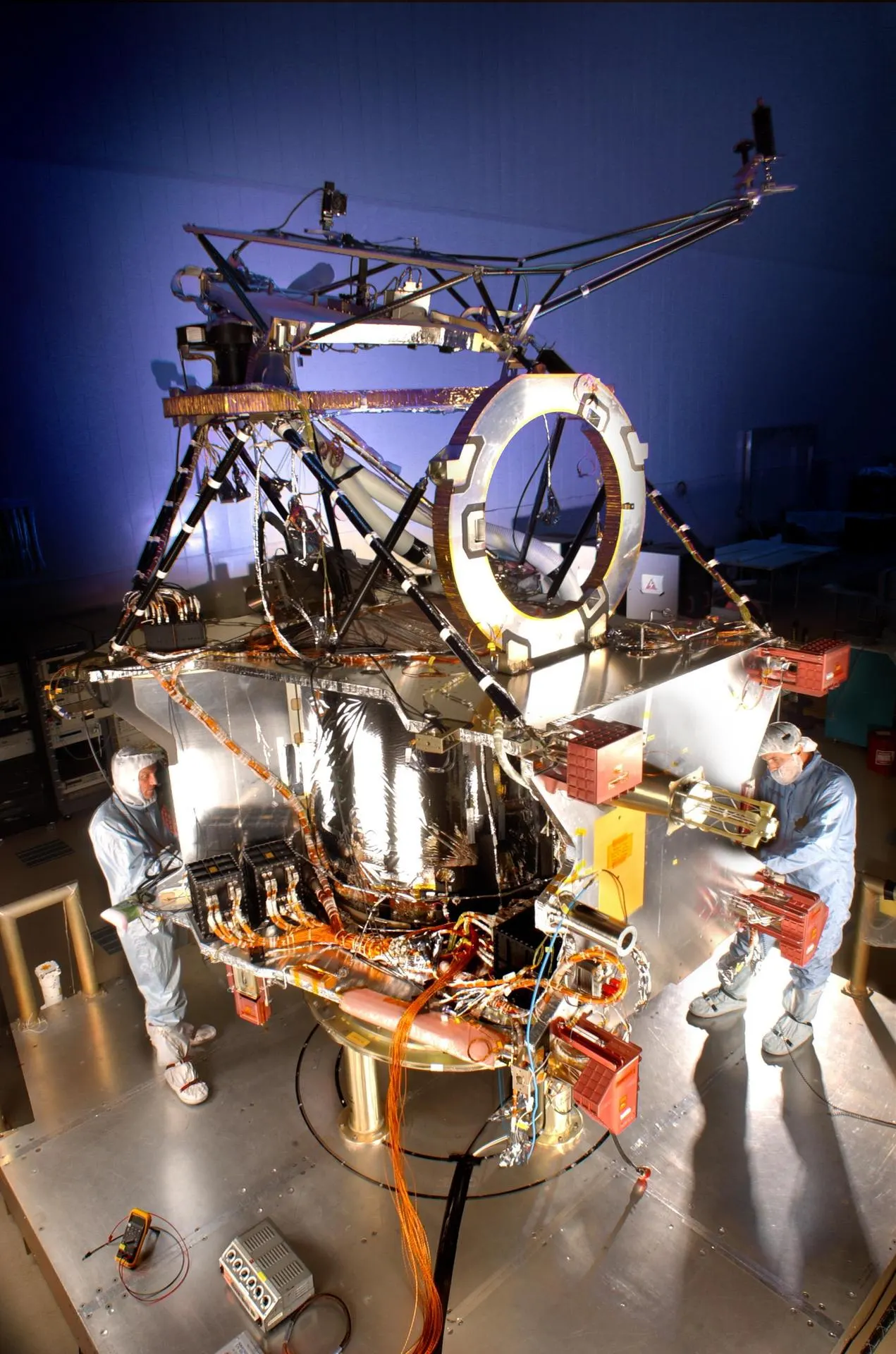 Engineers assemble the Mars Reconnaissance Orbiter spacecraft bus in a Lockheed Martin cleanroom, 2004