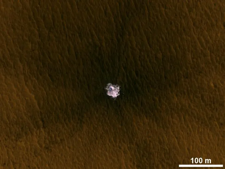 Fresh mid-latitude Mars crater that excavated bright water ice from just beneath the surface (HiRISE)