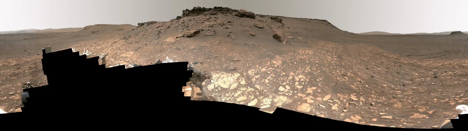 Natural-color panorama of rust-red, iron-oxide-rich Martian rock and regolith in Jezero Crater