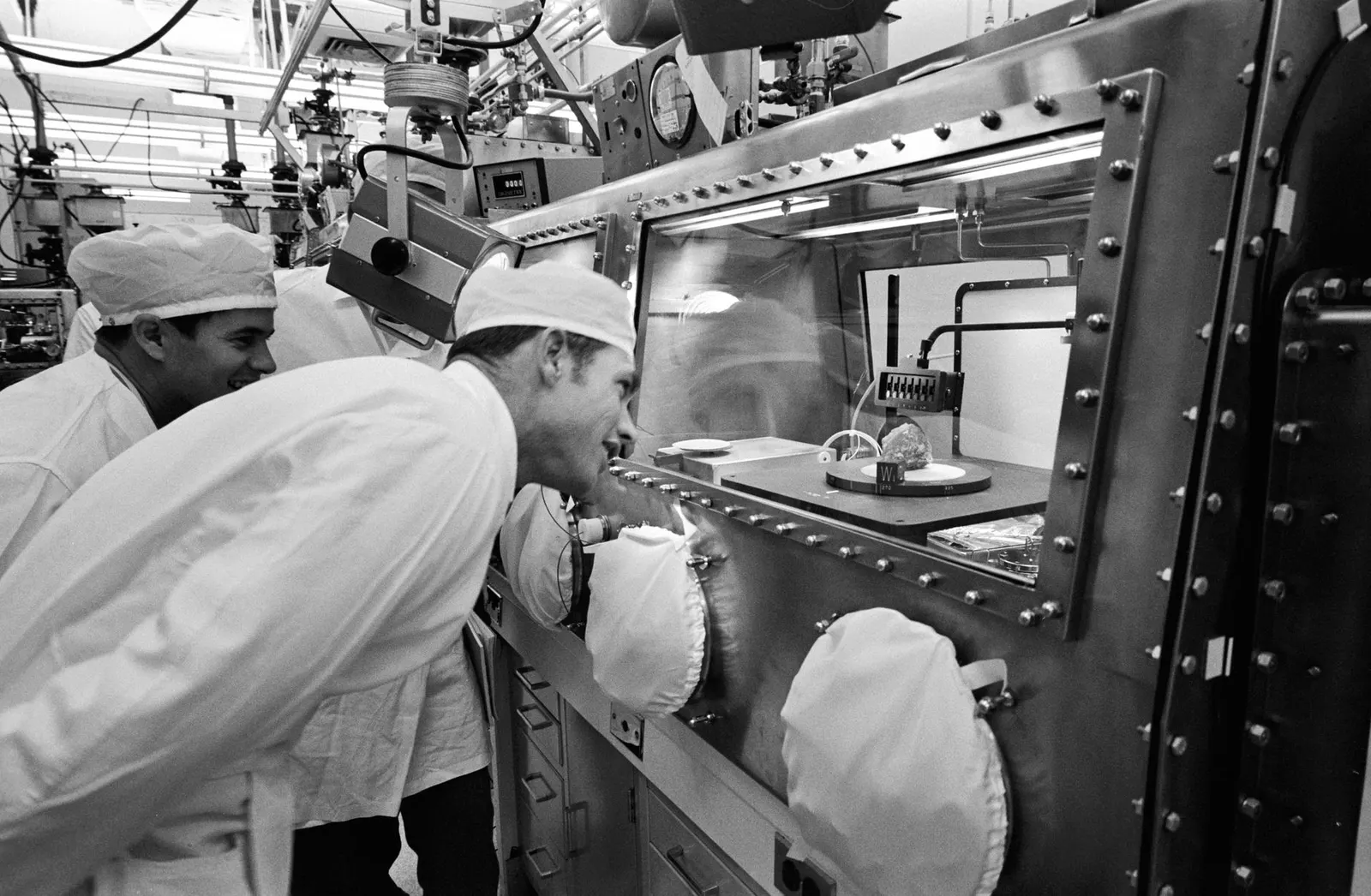 Astronaut David Scott with the Apollo 15 Genesis Rock sample (15415)