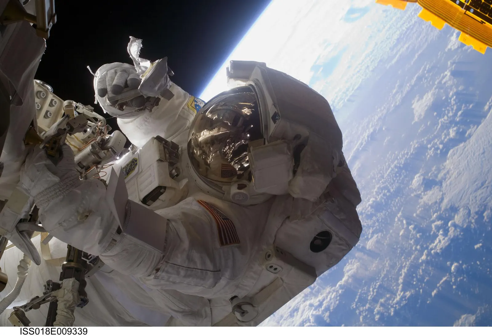 Astronaut Steve Bowen works on the ISS starboard Solar Alpha Rotary Joint during the first STS-126 spacewalk