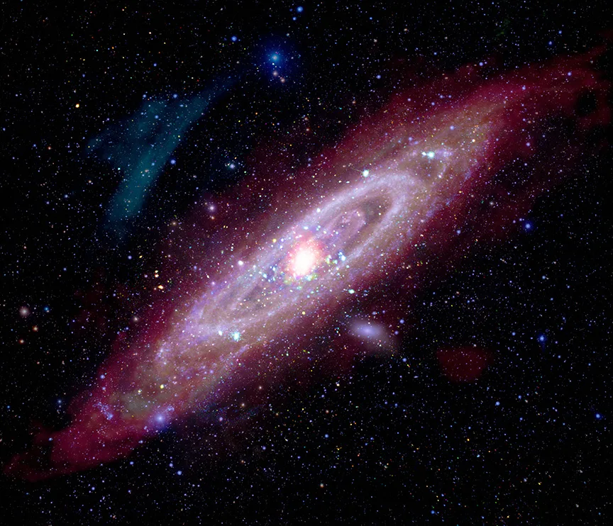 Andromeda Galaxy in multi — Five-wavelength composite spanning radio to X-ray: cold H I disc, warm 24 μm dust ring, resolved stellar disc, UV star-forming arms, and X-ray nucleus and binaries — the full galactic ecosystem.