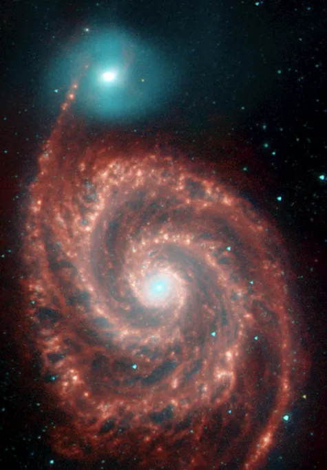 M51 (Whirlpool Galaxy) in infrared — Spitzer 8 μm emission from PAH molecules traces the warm ISM in the spiral arms with exquisite fidelity, acting as a direct proxy for recent star-formation activity.