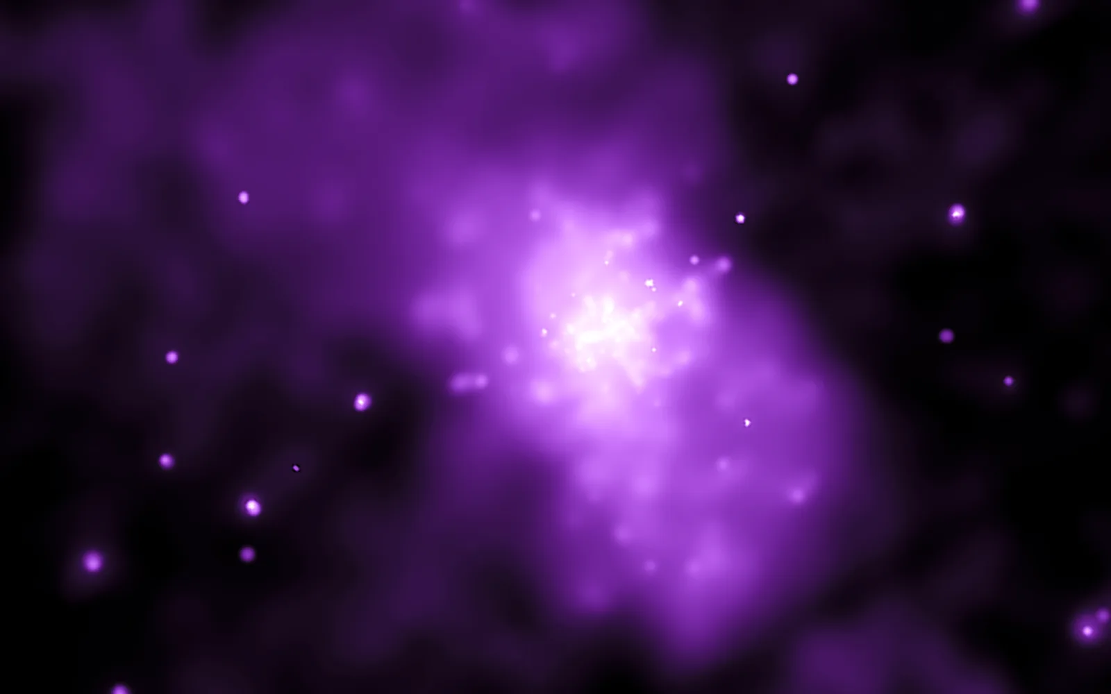 M82 (Cigar Galaxy) in xray — Chandra reveals M82's million-degree gas — the diffuse glow of the superwind threading out of the galaxy, studded with bright X-ray binaries and ultraluminous sources.