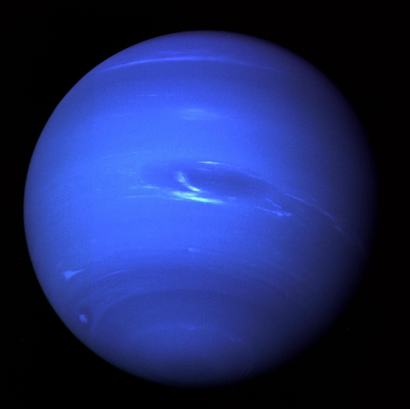 Neptune's deep blue disk with its Great Dark Spot, imaged by NASA's Voyager 2 in 1989 (NASA/JPL)