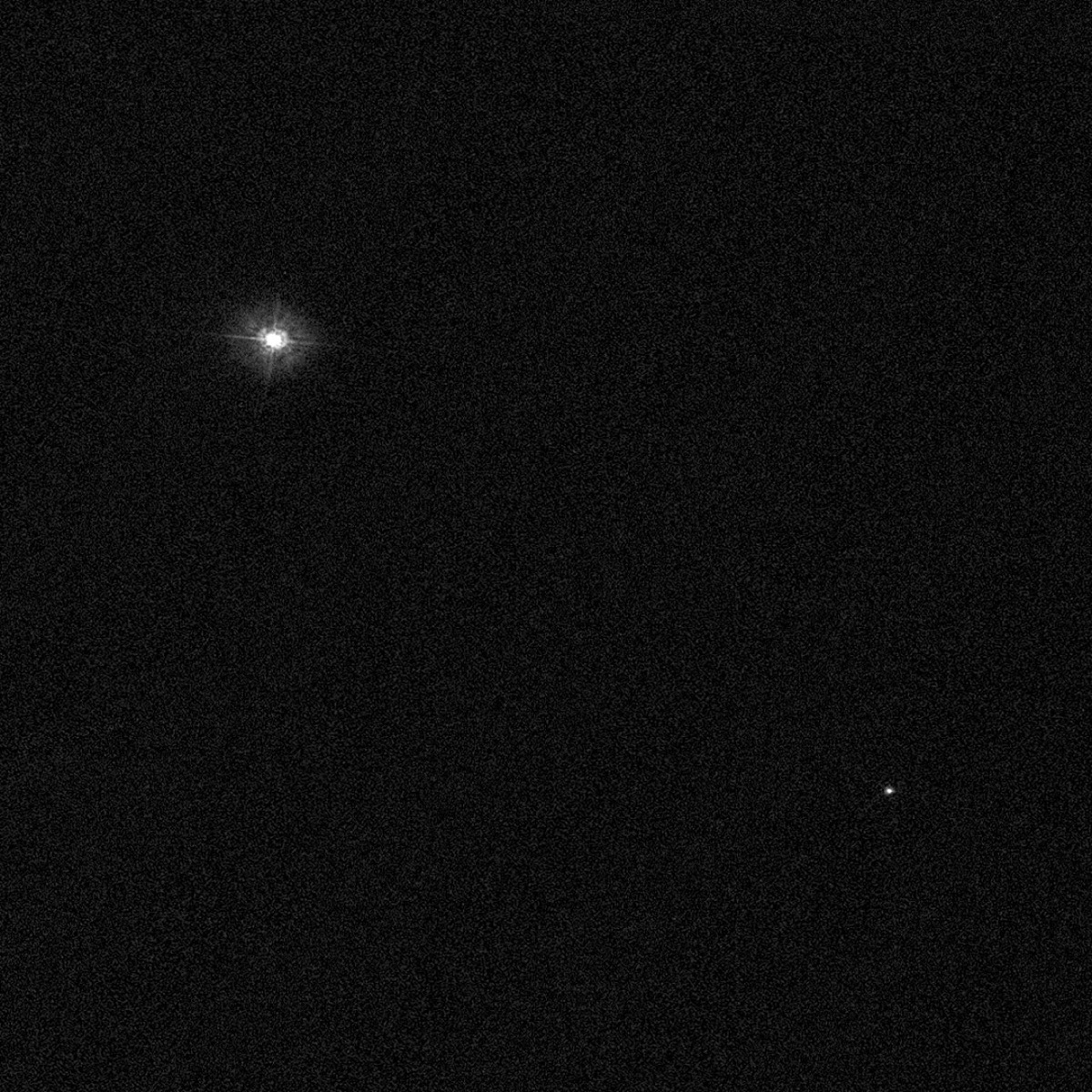 Hubble Space Telescope image of Polaris A and its distant companion Polaris B imaged in near-ultraviolet by ACS